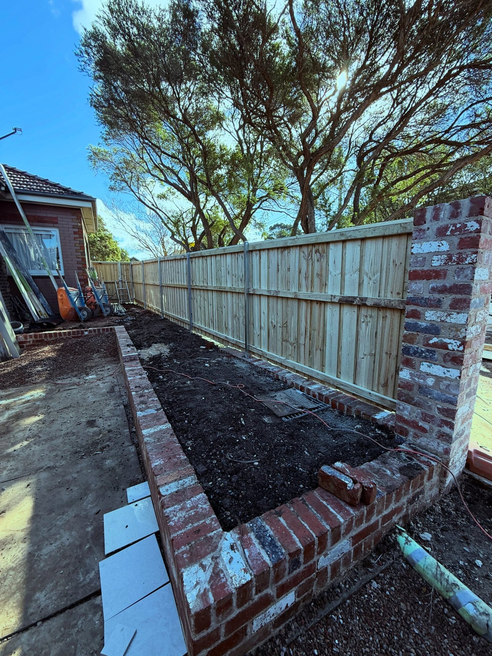 Lap and cap timber fence, 1.8 m high, installed in NSW