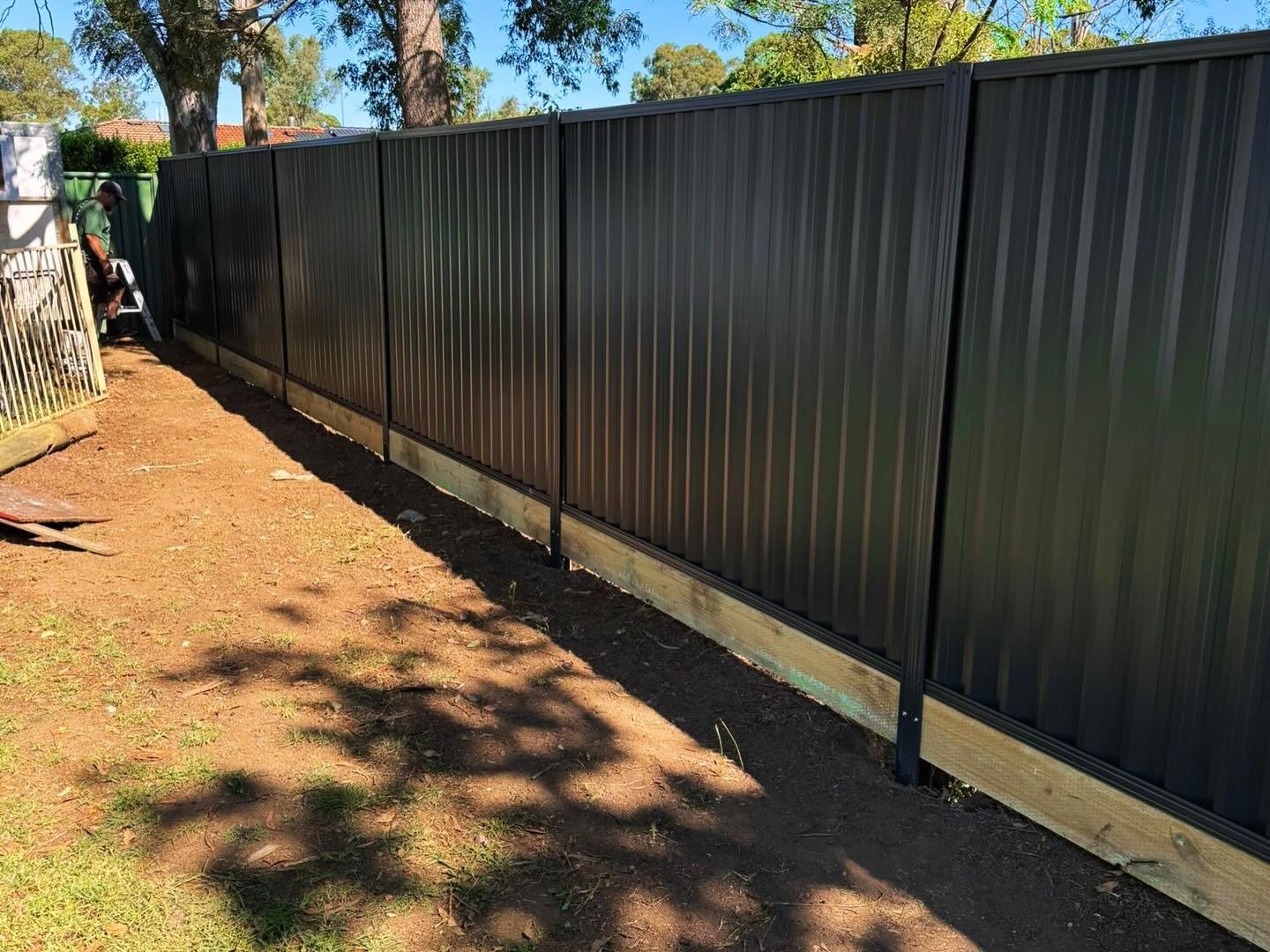 Colorbond fence 1.8 m high with bottom sleeper, NSW